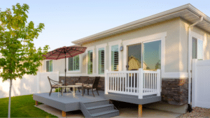 Back of a home with a sliding glass patio door